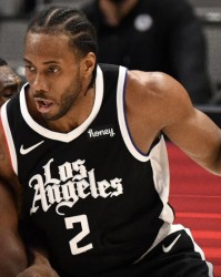  东契奇揽三双独撑大局，独行侠加时险胜快船