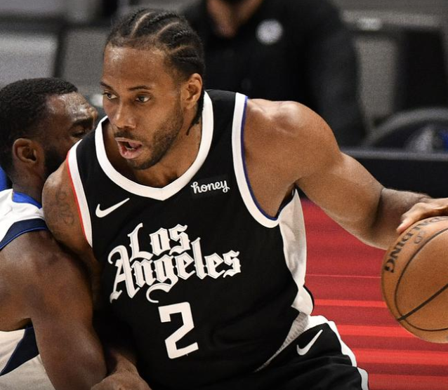  东契奇揽三双独撑大局，独行侠加时险胜快船